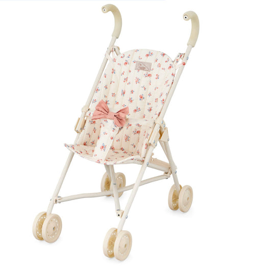 Stilvoller Puppenbuggy für Kinder mit 4 Rädern, gepolsterten Griffen und liebevollem Design.