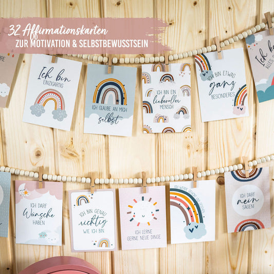 32 Affirmationskarten für Kinder in hübschen Regenbogen-Design. Jede Karte zeigt einen anderen Spruch. 