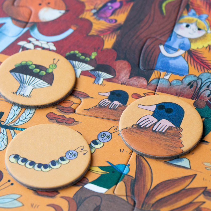 Bei dem Puzzle von Londji sind 24 Suchchips dabei, die nach dem Puzzeln auf das Puzzle an die richtige Stelle gelegt werden können. 