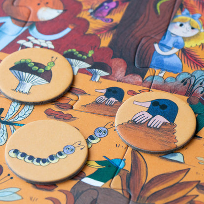 Bei dem Puzzle von Londji sind 24 Suchchips dabei, die nach dem Puzzeln auf das Puzzle an die richtige Stelle gelegt werden können. 