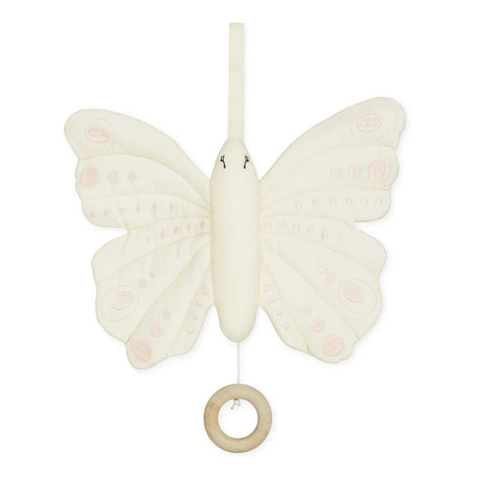 Schmetterling in altweiß mit rosa Punkten und einem Holzring zum Aufziehen der Spieluhr