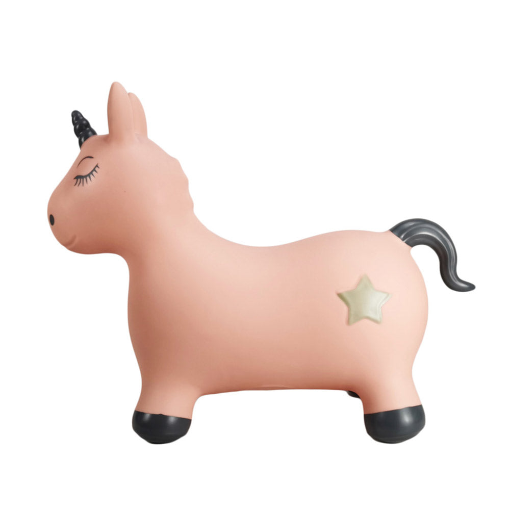 Springtier Einhorn in der Farbe rosa mit einem goldenen Stern auf der hinteren Seite